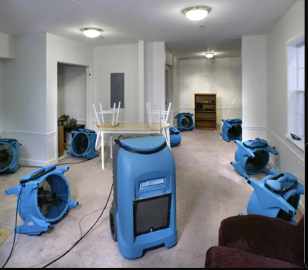 Air movers and dehumidifier setup for Water Damage Restoration in Geneva